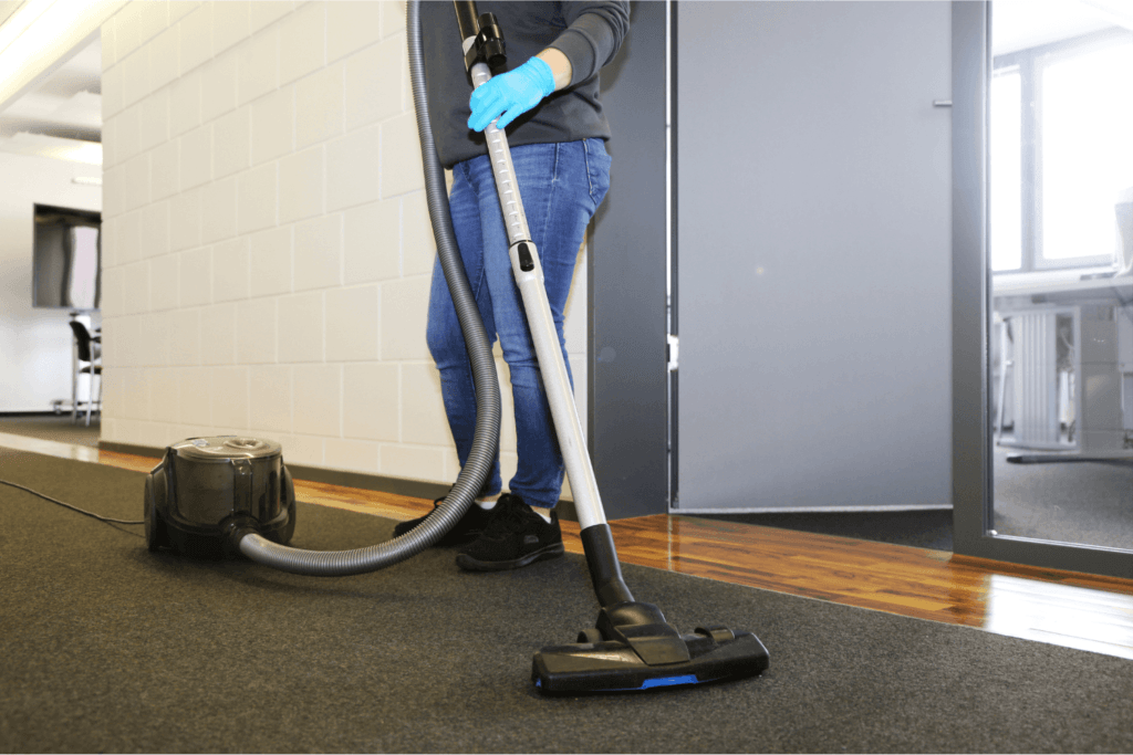office hallway being vacuumed